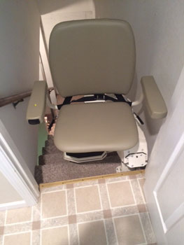 Merrett Stairlifts - Basement stairlift at top